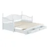 A white wooden daybed with two drawers underneath, shown from a diagonal angle against a white background. Náhľad obrázku produktu