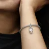 A close-up shot of a person's arm wearing a silver Pandora bracelet with a snowflake charm. Podgląd zdjęcia produktu
