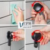 Collage showing the steps to install a suction cup toilet paper holder. Produktbild-Vorschau