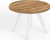 A round wooden table with white legs on a white background. Produktbild-Vorschau