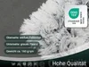 A close-up of a fluffy white blanket with text overlays describing its features and a certification logo. Produktbild-Vorschau