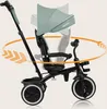 A multifunctional tricycle and stroller is shown with a rotating seat feature indicated by an orange circular arrow. Produktbild-Vorschau