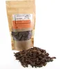 A bag of oak chips and a pile of oak chips on a white background. Produktbild-Vorschau
