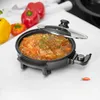 A multi-functional electric pan filled with food, with vegetables in the background. Produktbild-Vorschau