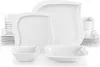 A collection of white porcelain dinnerware, including plates and bowls, arranged on a white background. Náhled obrázku produktu