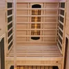 Interior view of a wooden infrared sauna cabin. Produktbild-Vorschau
