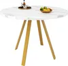 A round white marble-patterned table with gold legs, set against a white background. A small tray with a bottle and glasses, and a bowl of fruit are on the table. Produktbild-Vorschau