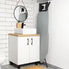 A bathroom vanity with a sink, mirror, and soap dispenser, next to a wall-mounted ironing board. Anteprima dell’immagine prodotto