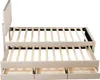 A beige upholstered bed frame with a pull-out trundle and three drawers, shown from a side angle against a white background. Náhľad obrázku produktu