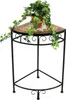 A corner plant stand with a potted ivy plant on top. Produktbild-Vorschau