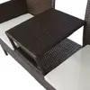 A close-up, angled view of a two-seater poly rattan sofa with a built-in tea table and white cushions. Náhled obrázku produktu