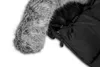 A close-up view of a black baby footmuff with faux fur trim. Náhled obrázku produktu