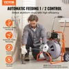 A man is using a pipe cleaning machine in a bathroom. Náhľad obrázku produktu