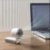 A white fan is blowing air towards a laptop on a wooden desk. Náhľad obrázku produktu