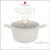 A white casserole dish with a glass lid and gold accents, presented with product dimensions and branding. Produktbild-Vorschau