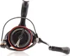 A close-up studio shot of a fishing reel against a white background. Produktbild-Vorschau