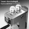 Close-up of an espresso machine with two clear glass cups on top. Náhľad obrázku produktu
