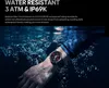 A person's arm wearing a smartwatch is submerged in water, with bubbles rising. Náhled obrázku produktu