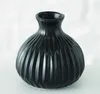 Vaso Esko in porcellana nero opaco H 12 cm Set di 3 Anteprima dell’immagine prodotto 11