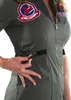 A close-up of a person wearing a gray flight suit with patches. Anteprima dell’immagine prodotto