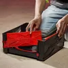 A person is assembling a Beyblade X stadium. Anteprima dell’immagine prodotto