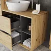 A bathroom vanity with a vessel sink and storage drawers. Anteprima dell’immagine prodotto