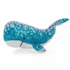 A plush toy whale with a geometric pattern. Produktbild-Vorschau
