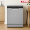 A silver Telefunken dishwasher is shown in a kitchen setting, next to kitchen cabinets and a wooden table with a plant. Produktbild-Vorschau