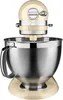 A cream-colored KitchenAid stand mixer with a silver bowl is shown against a white background. Produktbild-Vorschau