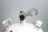 Close-up of the top of a white gas cylinder, showing the valve and a multi-functional wrench attached. Produktbild-Vorschau