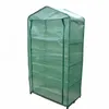 A green four-tier greenhouse on a white background. Voir les images du produit