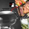 A charcoal grill with food cooking on it, with an overlay indicating capacity. Produktbild-Vorschau