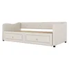 A studio shot of a beige upholstered daybed with two drawers underneath, set against a white background. Produktbild-Vorschau
