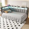 A modern, upholstered daybed with integrated LED lighting and storage shelves, set up in a bedroom or living space. Podgląd zdjęcia produktu