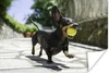 MuchoWow® Poster Ein schwarzer Dachshund mit einem Produktbild-Vorschau 1