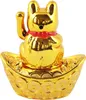 A golden lucky cat figurine sits on a boat filled with gold coins. Produktbild-Vorschau