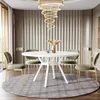 A dining table set with chairs in a modern dining room. Náhled obrázku produktu