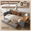 A bedroom scene showcasing a bed with integrated storage and a desk. Produktbild-Vorschau