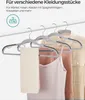 A set of clothes hangers holding various garments, with text describing their use and capacity. Náhľad obrázku produktu