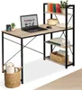 A computer desk with shelves and a laptop on it. Náhled obrázku produktu