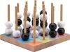 A wooden game with black and white balls on wooden pegs. Produktbild-Vorschau