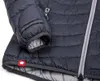 Dunkelgraue Isolationsjacke "TSUNAMI ECO Women" von Ocun mit gestepptem Design und rotem Markenlabel. Produktbild-Vorschau