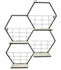 A black metal hexagon shelf with light wood shelves against a white background. Produktbild-Vorschau