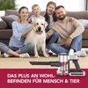 A family and their dog are sitting on the floor with a vacuum cleaner. Produktbild-Vorschau