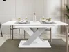 A dining table set with place settings in a modern dining room. Anteprima dell’immagine prodotto