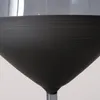 A close-up shot of the lower portion of a black wine glass. Náhled obrázku produktu
