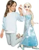 A young girl is playing with a large Elsa doll. Produktbild-Vorschau