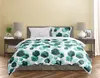 A neatly made bed with a geometric patterned duvet and pillows, flanked by nightstands with lamps and decorative items. Podgląd zdjęcia produktu