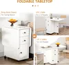 A collage of images showing a white foldable table in different configurations, with text overlays describing its features and use cases. Produktbild-Vorschau