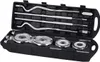 A black carrying case containing a set of dumbbells and weight plates. Náhled obrázku produktu